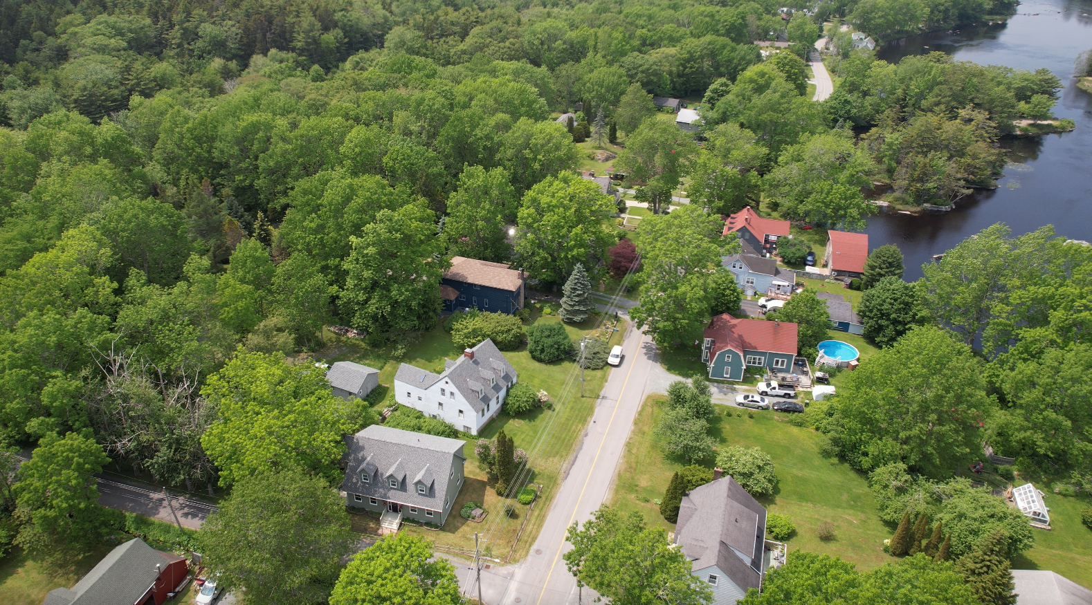 Aerial view of a luxury home with a pool